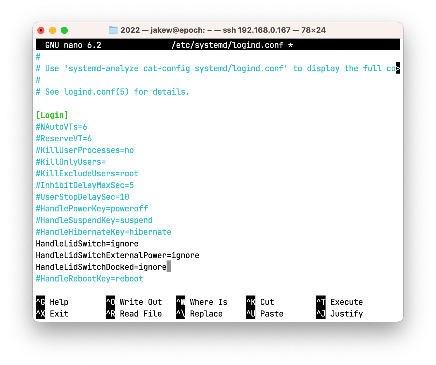 Setting `HandleLidSwitch`, `HandleLidSwitchExternalPower` and `HandleLidSwitchDocked` to `ignore` in the `/etc/systemd/logind.conf` file