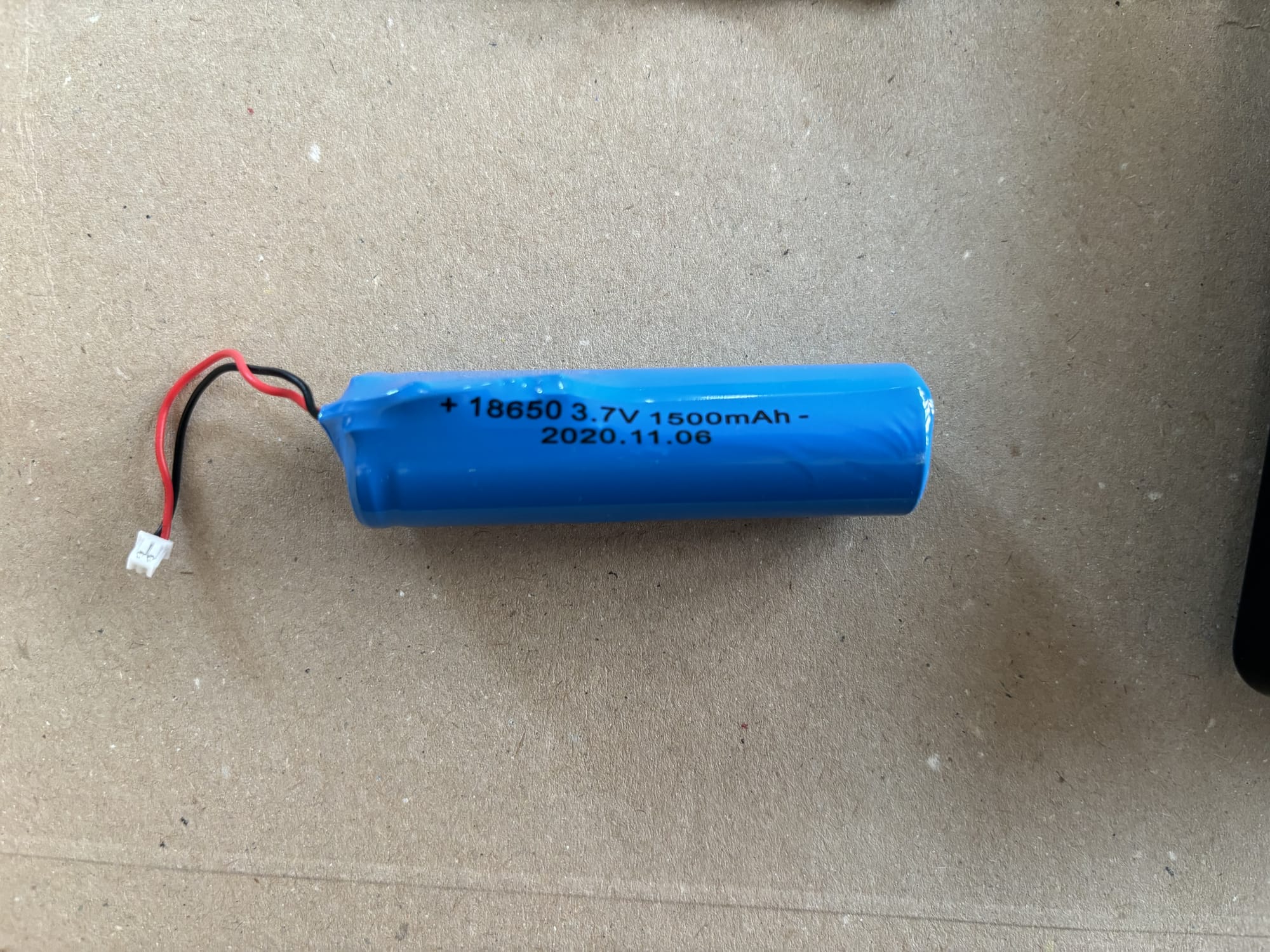 The 18650 battery extracted from the second board in the barcode scanner.